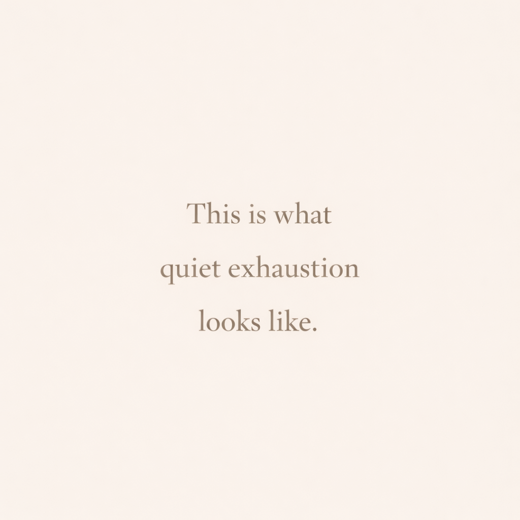 Minimalist neutral-toned graphic with centered serif text: “This is what quiet exhaustion looks like,” representing emotional and mental fatigue.